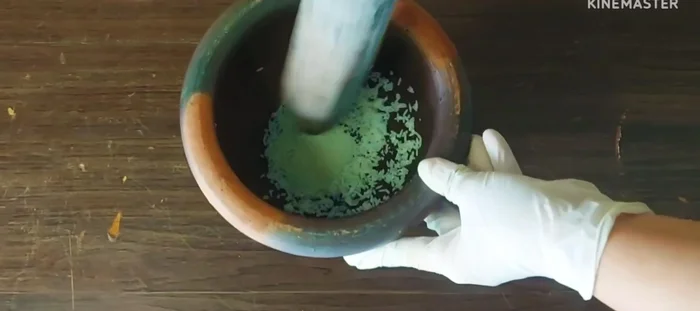Prepare the curry paste: Soak rice (or use 1.5 tbsp of water if omitting rice) and pound together with chilies, shallots, and lemongrass until smooth.