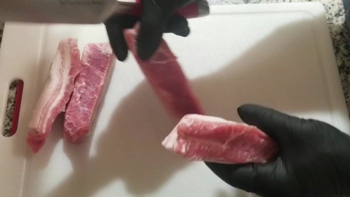 Cut the 1 pound pork belly into 1-inch squares.
