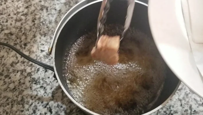 Remove the pork belly and drain on paper towels.