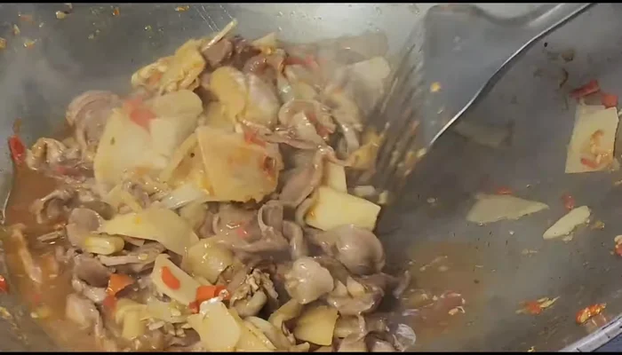 Stir-fry until the sauce reduces and bamboo shoots are cooked (approximately 5 minutes).