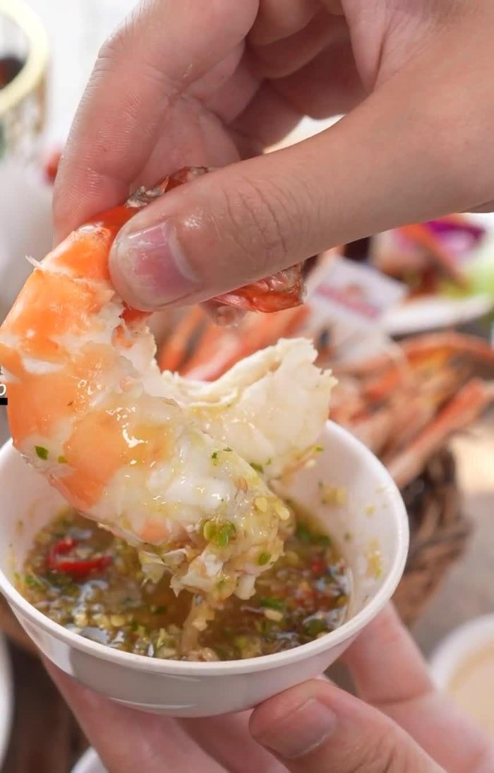 Place the prawns on the grill and cook for several minutes per side, until they are cooked through and slightly charred.