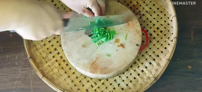 Finely chop the coriander.