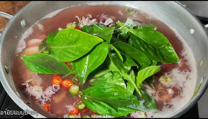 Squeeze fresh lime juice over the squid.