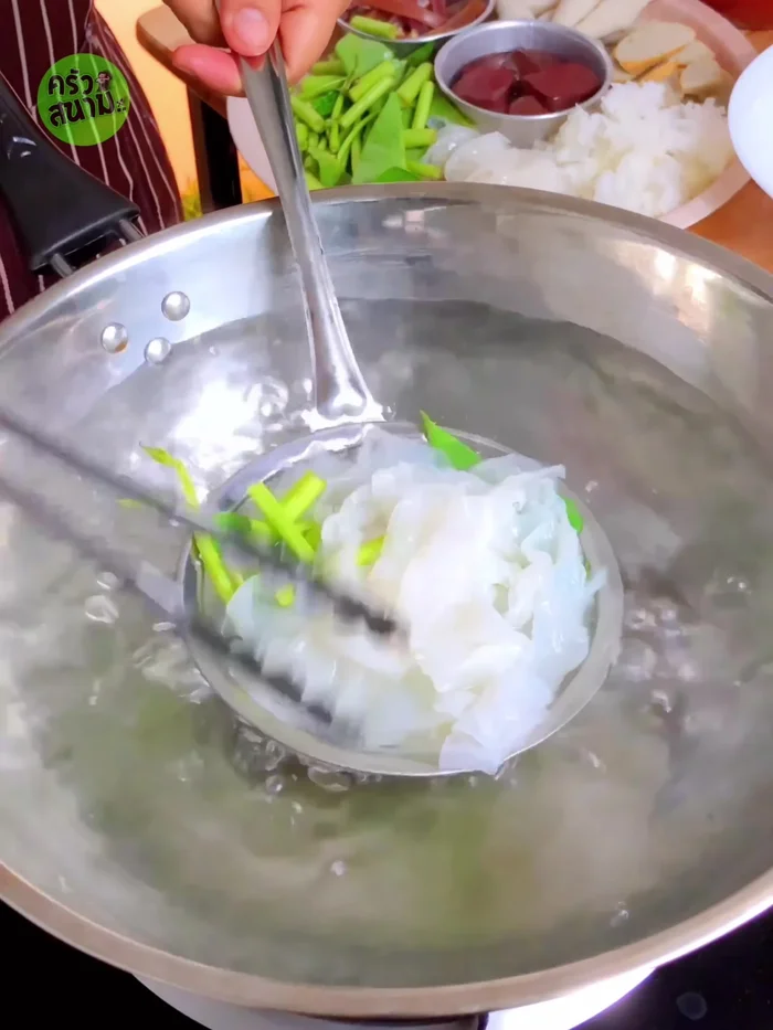 Serve noodles in a bowl. Add soup, Yen Ta Fo sauce (1.5 tablespoons), and other desired toppings.