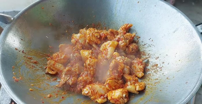 Add water (about 500ml) and stir-fry until the chicken is firm.