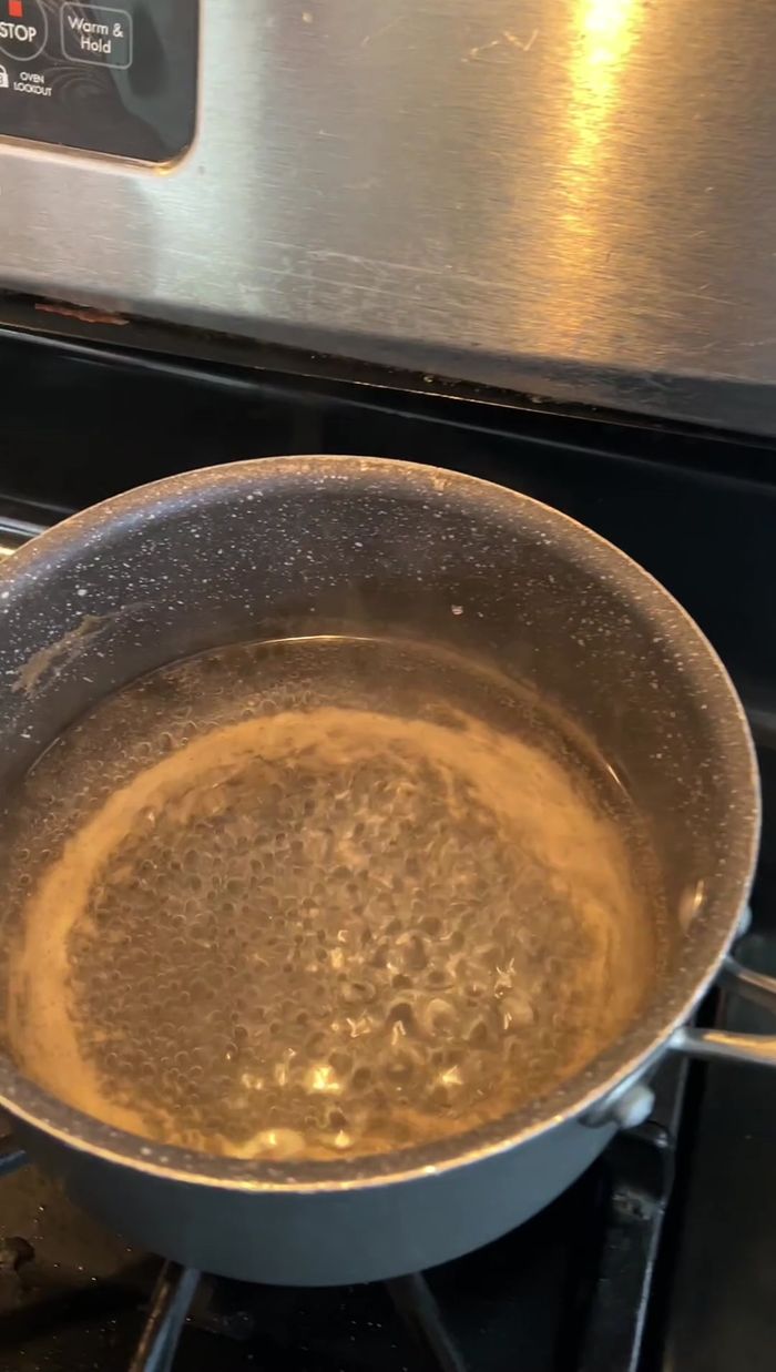 Cook the chicken. (Method not specified in transcript)