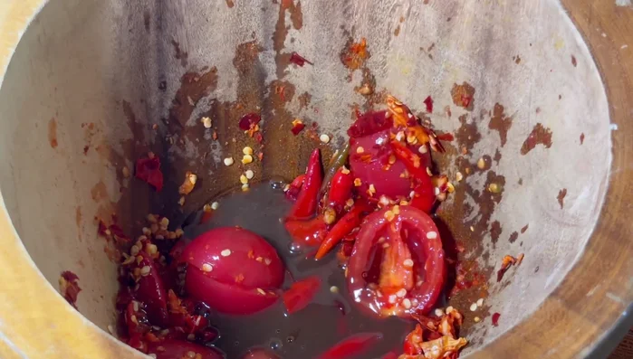 Add fish sauce and water.