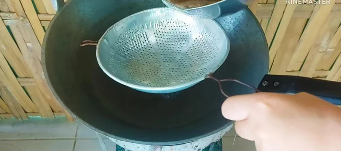 Once the fish is boiled, strain the broth to remove solids.