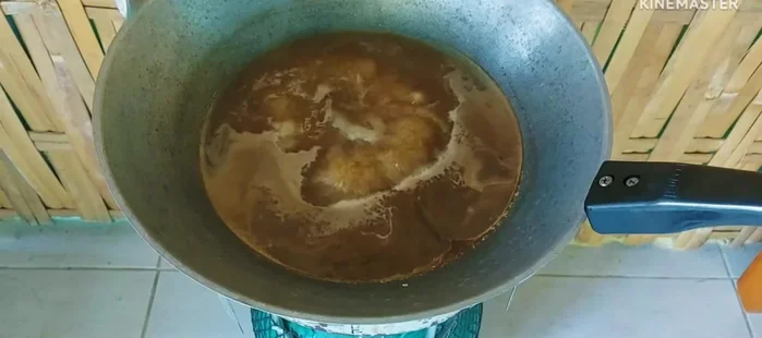 Add the minced pork to the broth and stir until tender.