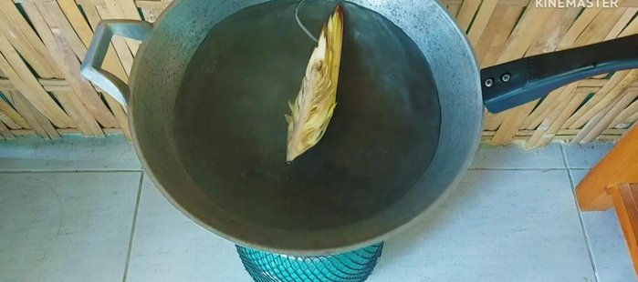 Boil banana blossom with 1 tablespoon of salt until soft. Rinse with cold water.