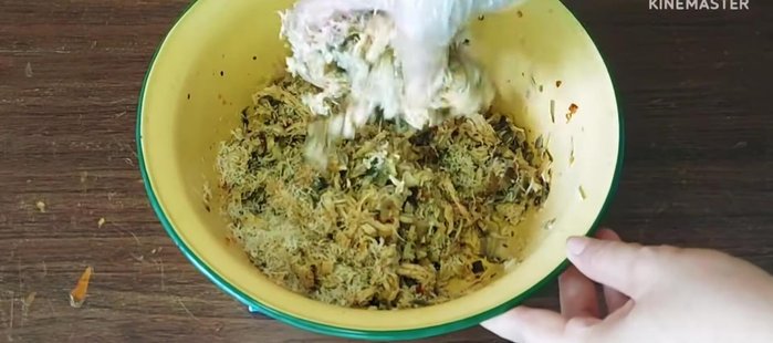 Add the boiled banana blossom and roasted coconut to the mixture. Stir-fry until well combined and heated through.