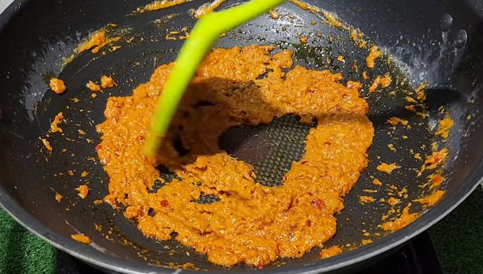 In a pot, heat coconut milk on medium heat until it separates.