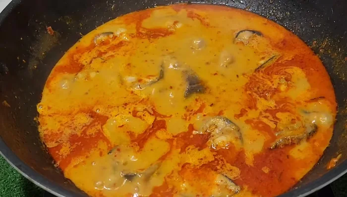 Season with fish sauce and sugar once the fish is cooked.