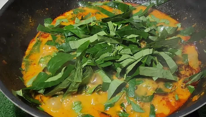 Stir gently and cook until the leaves are tender.