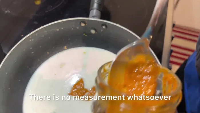 Add 2-3 tablespoons of red Thai curry paste. Adjust the amount to your spice preference.