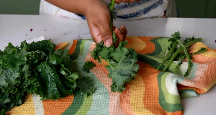 Prep kale: Remove stems and tear into bite-sized pieces. Massage gently to break down leaves.