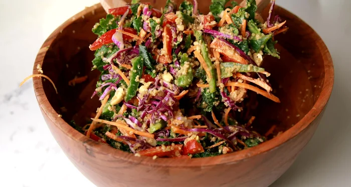 Combine dressing and salad: Add dressing to the salad bowl and toss everything together.
