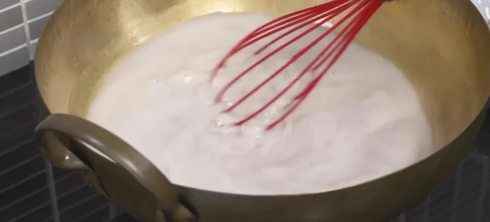 Cook the dumpling dough: Cook the dough in a pot over medium-high heat, stirring constantly to prevent sticking. Cook until the flour is cooked and the mixture thickens.