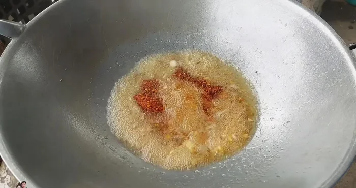 Add 1/2 tablespoon of chili powder and 1/2 teaspoon of MSG (optional).