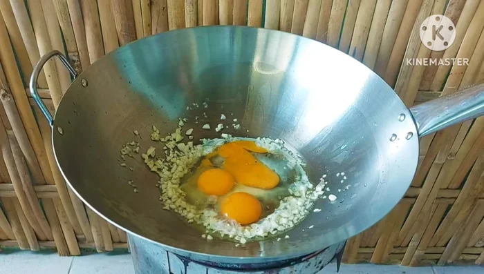 Add eggs and stir-fry until almost crispy.