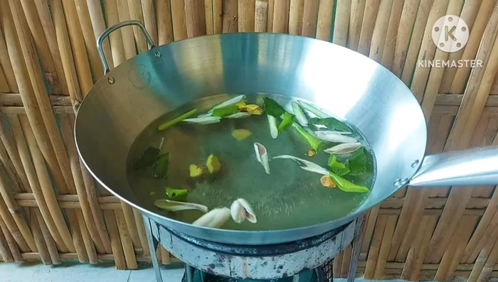 Blanch the apple snails briefly in the boiling water with herbs. Do not overcook to prevent them from becoming mushy. Immediately transfer to ice water to stop the cooking process and retain crispness.