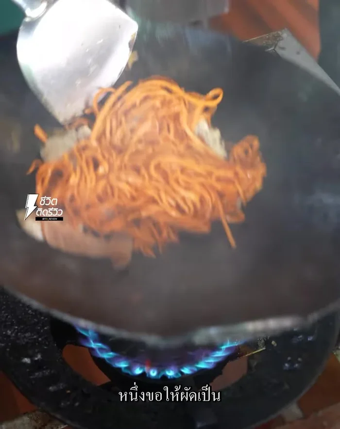 Stir-fry the chicken in a wok over high heat. The high heat is essential for achieving the right texture.