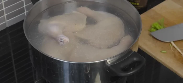 Add coriander root, garlic, and pepper (optional).