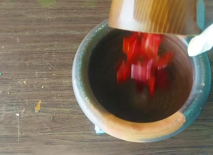 Soak dried chilies in water until soft.