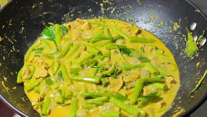 Simmer until the morning glory is cooked and the flavors have melded.