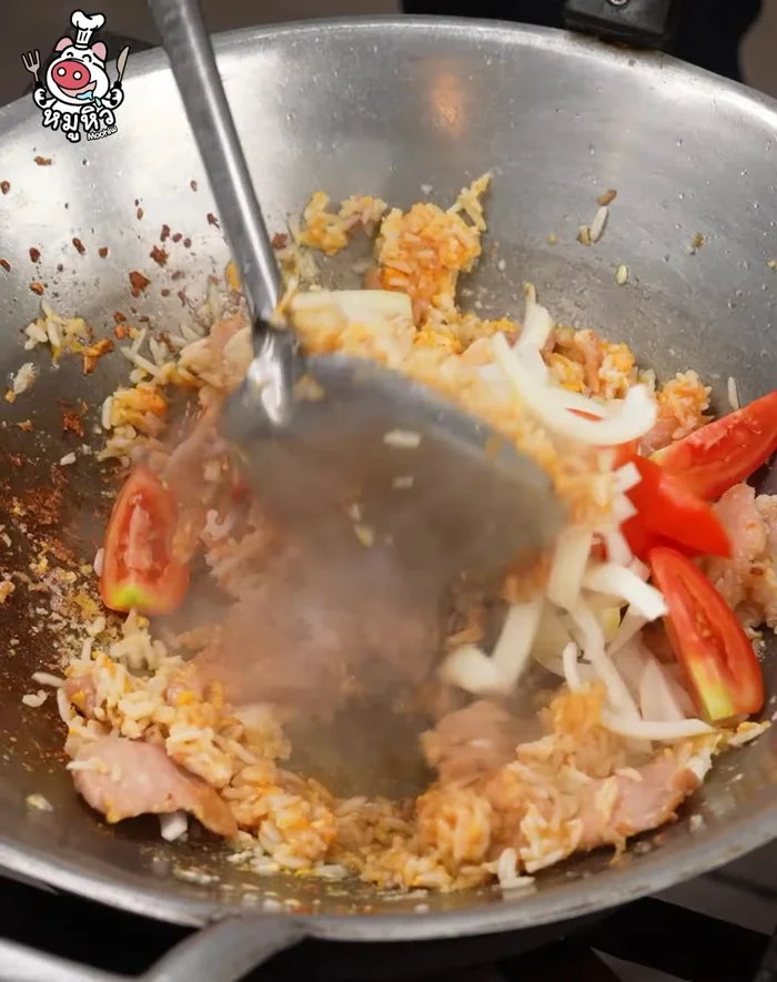 Add the onions and tomatoes, and mix well.