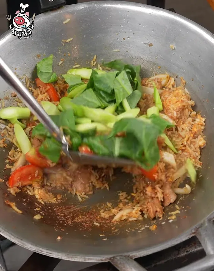 Add the kale and stir-fry until everything is cooked and well-mixed.