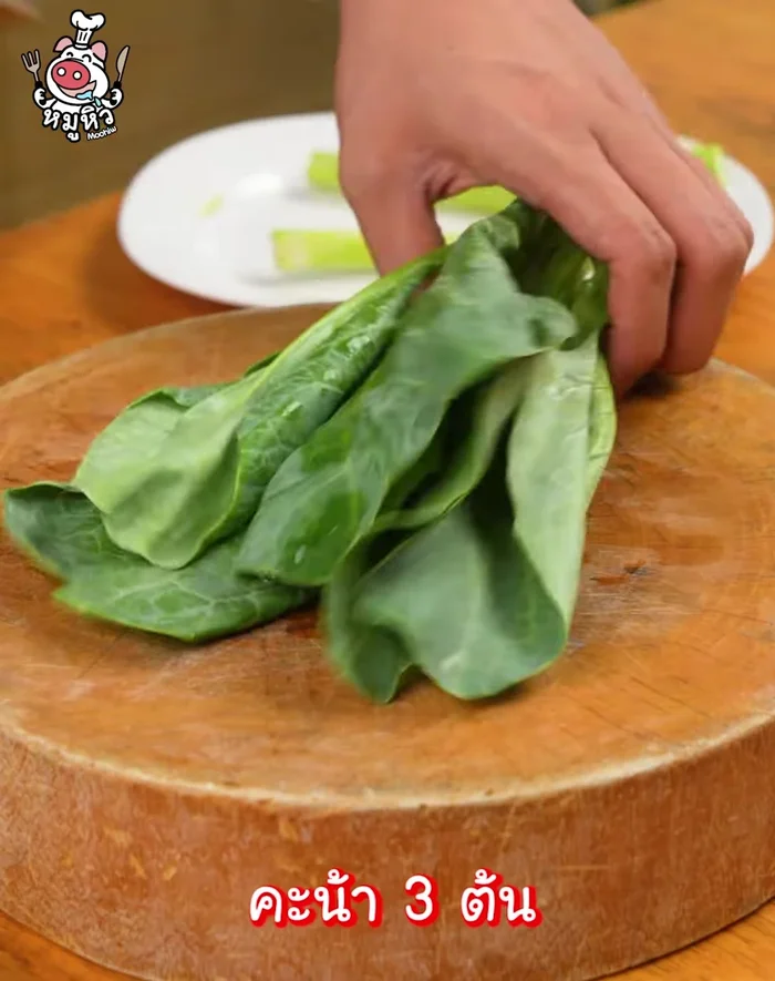 Wash and chop the kale leaves into bite-sized pieces. Set aside.