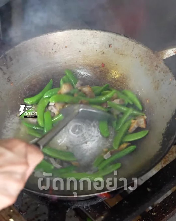 Heat oil in a large frying pan and fry the marinated pork neck until golden brown and crispy.