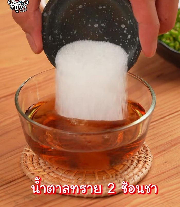 Recipe 3: Combine fish sauce, sugar, garlic powder, chopped green chili, and lime juice. Top with coriander. Mix well.