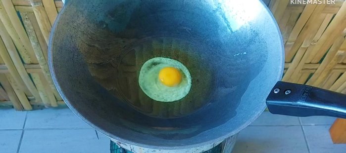 Fry the eggs: Heat oil in a pan. Add eggs and fry until cooked through to your desired level of doneness (runny or hard-boiled yolk). Set aside.