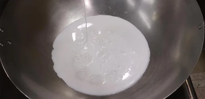 Add chicken and stir-fry until lightly browned.