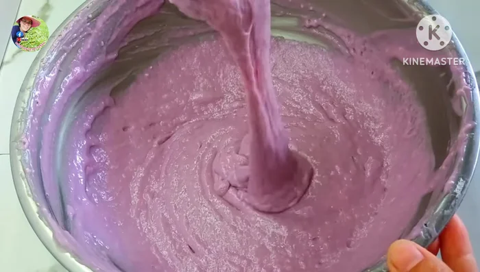 Gently stir the dough to remove air bubbles.