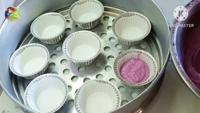 Scoop the dough into aluminum cups.