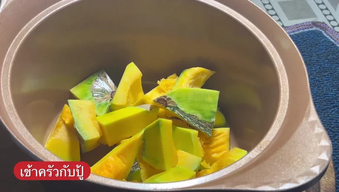 Place the pumpkin pieces in a pot.