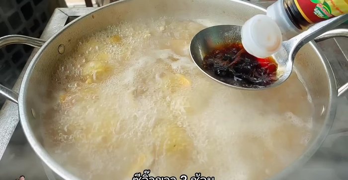 Add 0.5 ladle of light soy sauce, 1 spoon of fish sauce, and 1 teaspoon of MSG (optional).