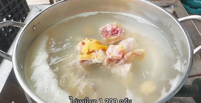 Add the chicken and let it simmer for about 30 minutes, skimming off any foam that rises to the surface. Do not stir frequently.
