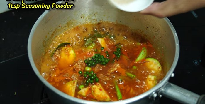 Season with pork seasoning powder and fish sauce to adjust saltiness.