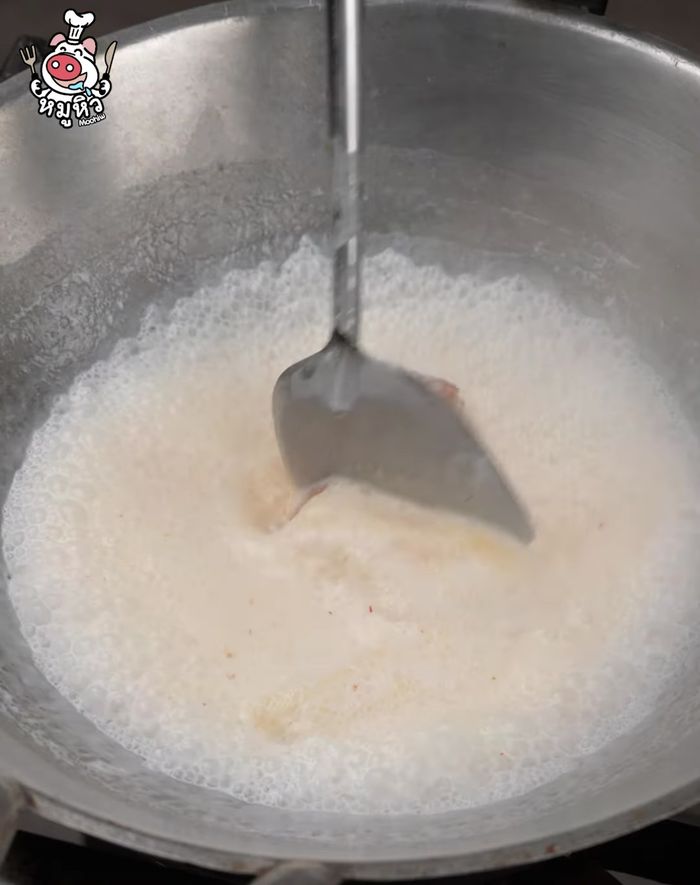 Stir until the curry is a beautiful orange color. Season with palm sugar and fish sauce.