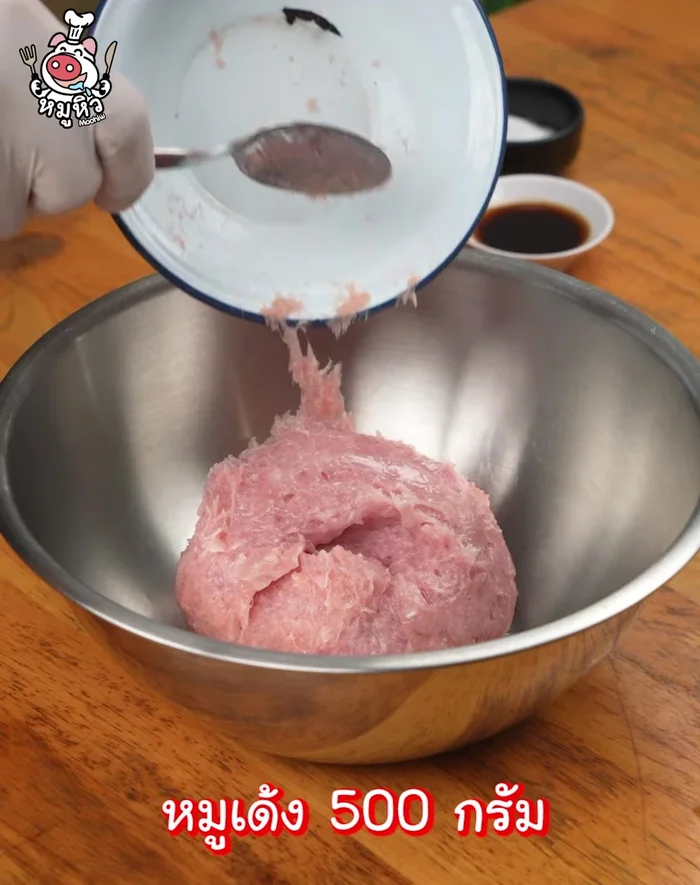 Prepare bouncy pork: Marinate pork balls with sugar, oyster sauce, and soy sauce.