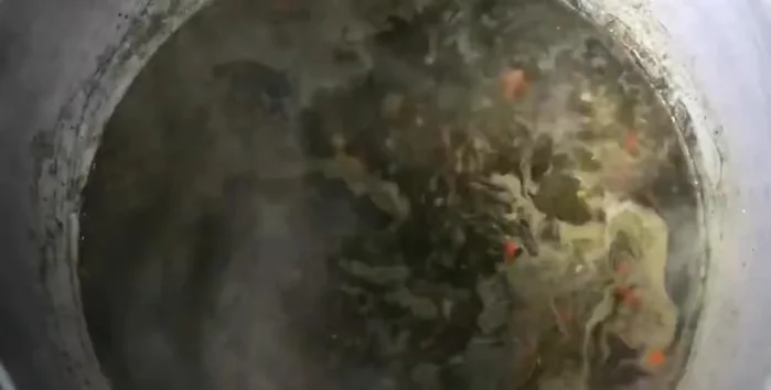 Once the water is hot, add the wood ear mushrooms, followed by the other 3 types of mushrooms.