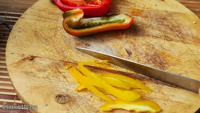 Cut bell peppers into strips.