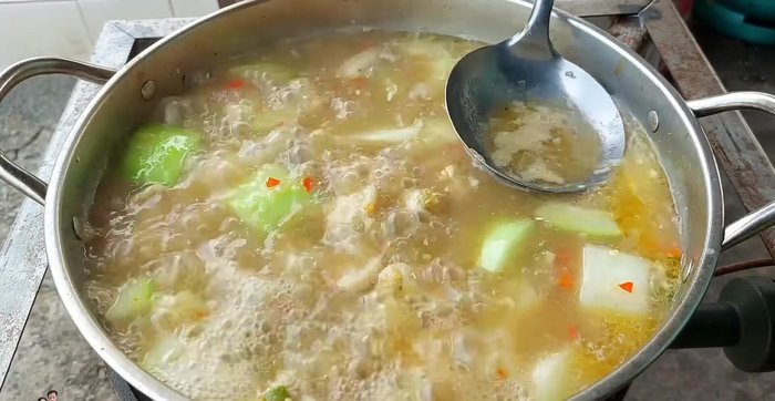 Simmer until the chicken is cooked and the pumpkin is tender. Remove excess chicken oil if desired.