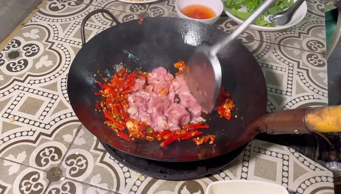 Add the chicken and stir-fry until well combined.