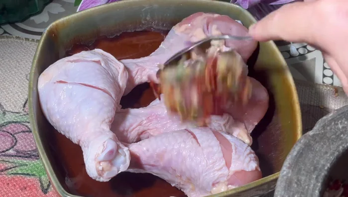 Prepare the chicken legs: Make incisions in the chicken legs to allow the marinade to penetrate.