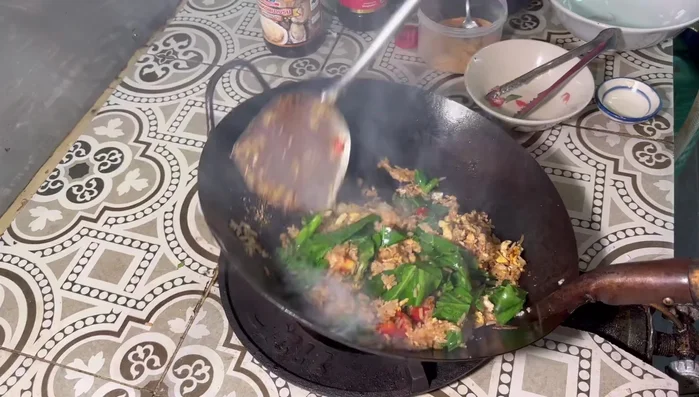 Add chopped kale and stir-fry until everything is well combined. Increase heat and stir-fry for another 2 minutes.